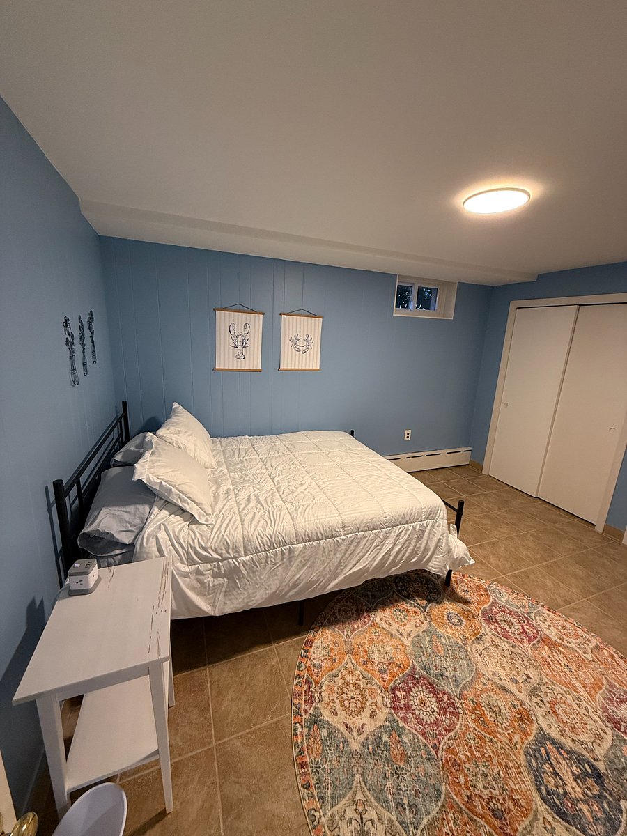 Spacious bedroom with queen bed and lost of closet space. 