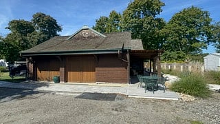 Spacious driveway is shared with landlords and has a dedicated parking space for you. The wooden walkway accesses the apartment. 