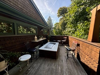 A gas firepit adds year round enjoyment of deck