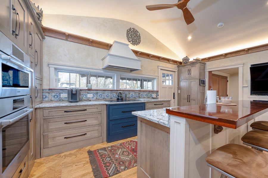 Windows allow you to look out on your tree fringed deck as you cook on the induction cooktop...