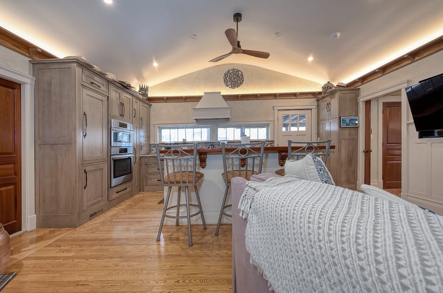 Open concept with barstools and large Smart TV allows for guests to  visit and enjoy the space with you! (WiFi included)