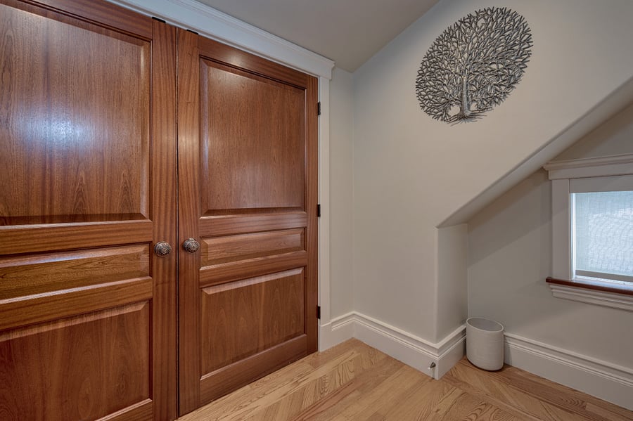 A large closet provides enough space for the clothing of two persons. 