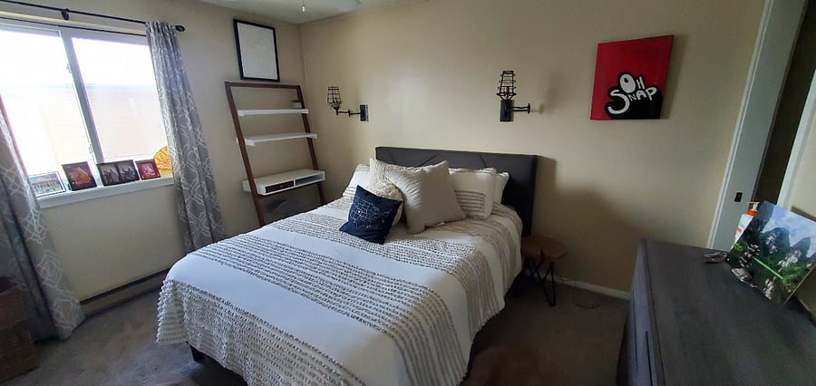 Master bathroom with queen size bed and Helix Luxury Mattress; Amenities: Desk with shelves, ceiling fan, medium-large closet, and 6-drawer dresser.
