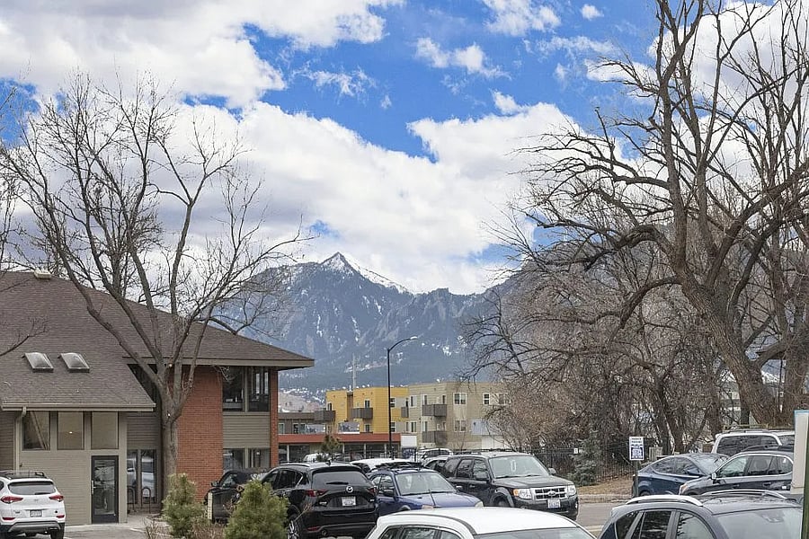 View of the Flatirons from the parking lot (this view is partially visible from the master bedroom window).
