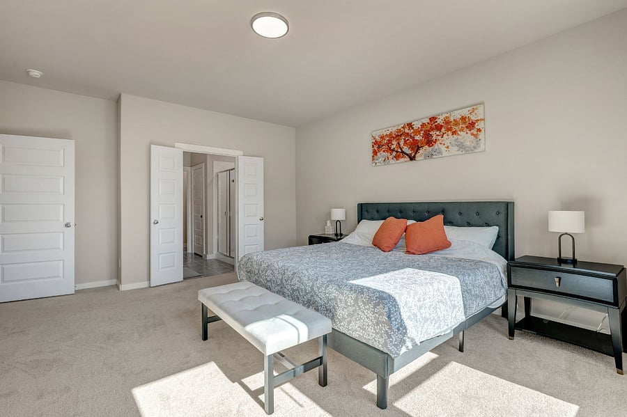 Main Floor -Master Bedroom Features a King Size Bed, Ensuite with a large walk in closet.and 65" Smart TV