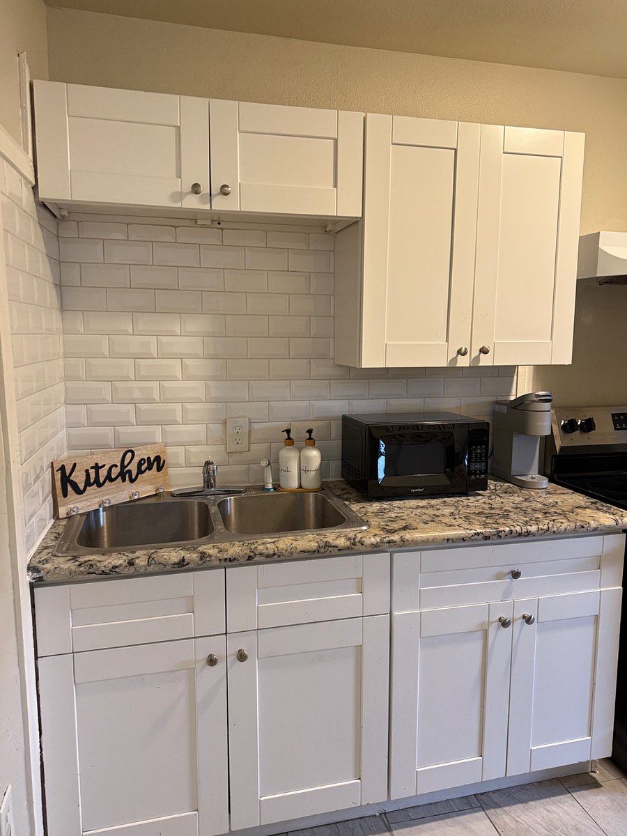 Kitchen with Keurig, air fryer and new microwave appliance