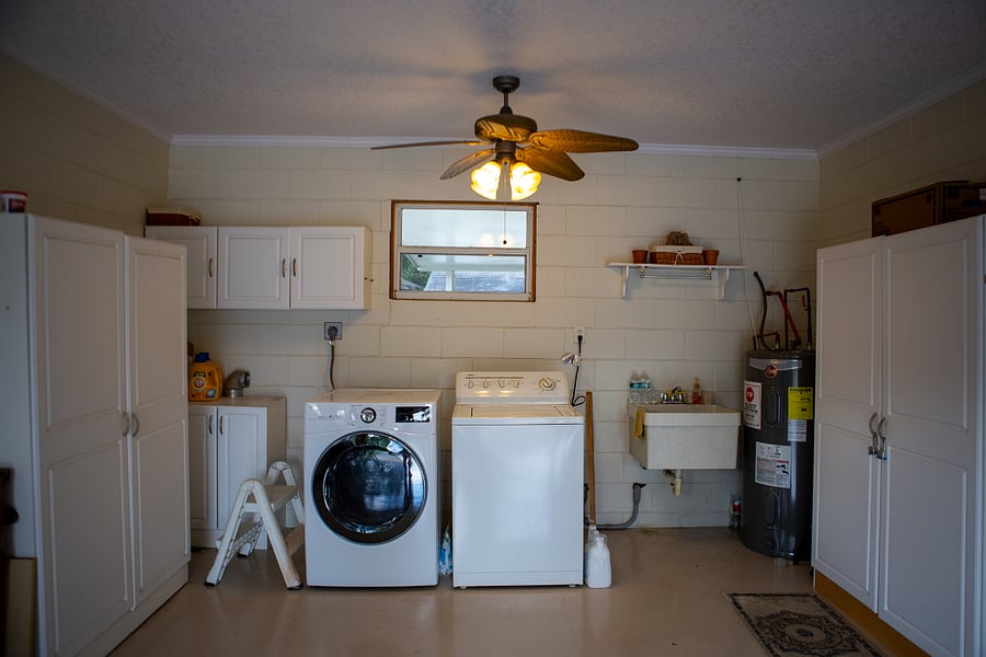 Washer and dryer conveniently located on site in the garage