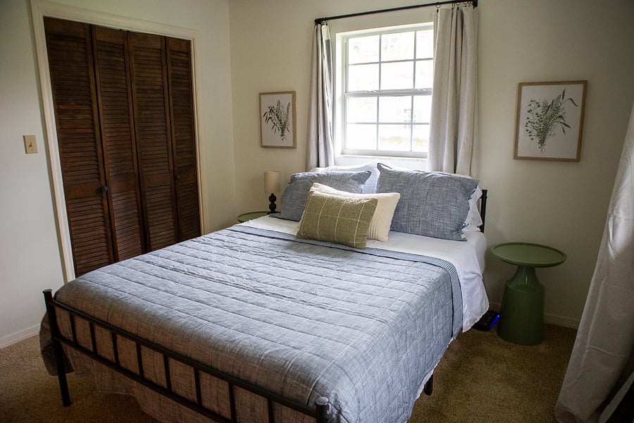 Bedroom 2 has a queen size bed and blackout curtains.