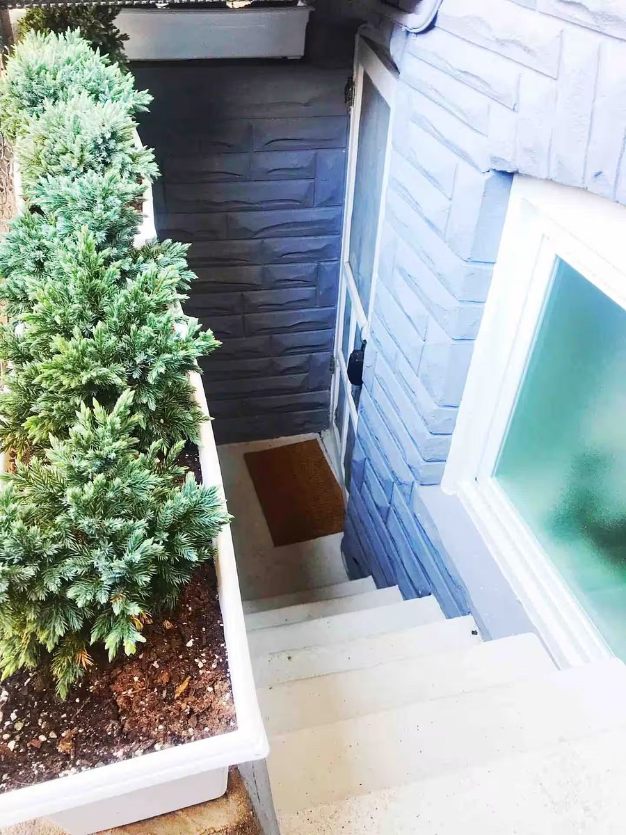 Backdoor entrance to first floor, if guests want a private entrance to the main floor. There is also a front door entrance to the second floor in the front