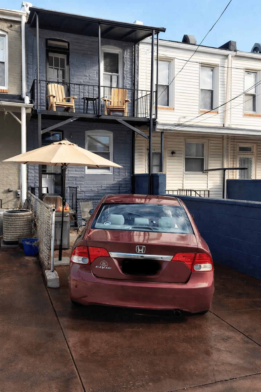 The parking pad is private and can fit a car as large as a Ford F150 truck, altough it would require painting diagonally as you see here 