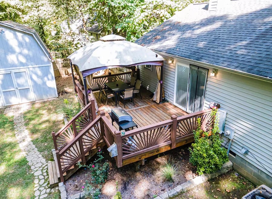 Gazebo, gas grill, table and chairs.