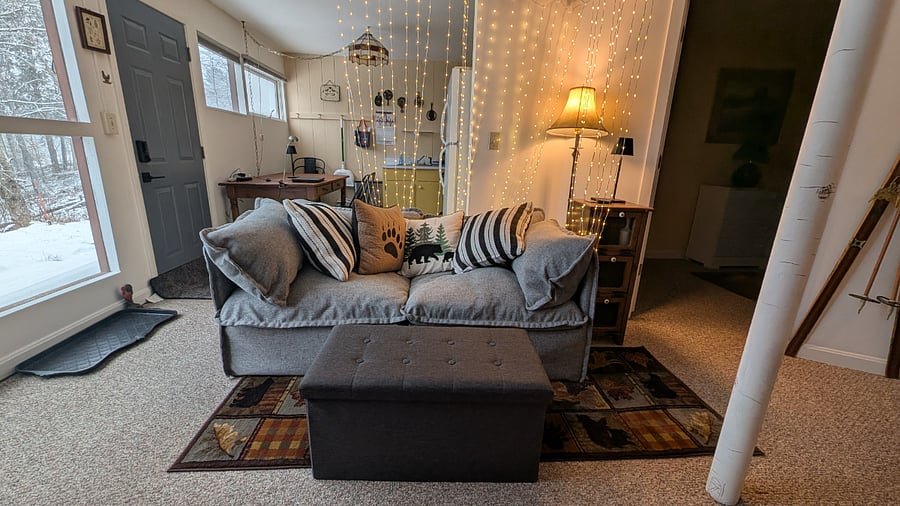 Sofa with ottoman for tired ski legs and blanket storage