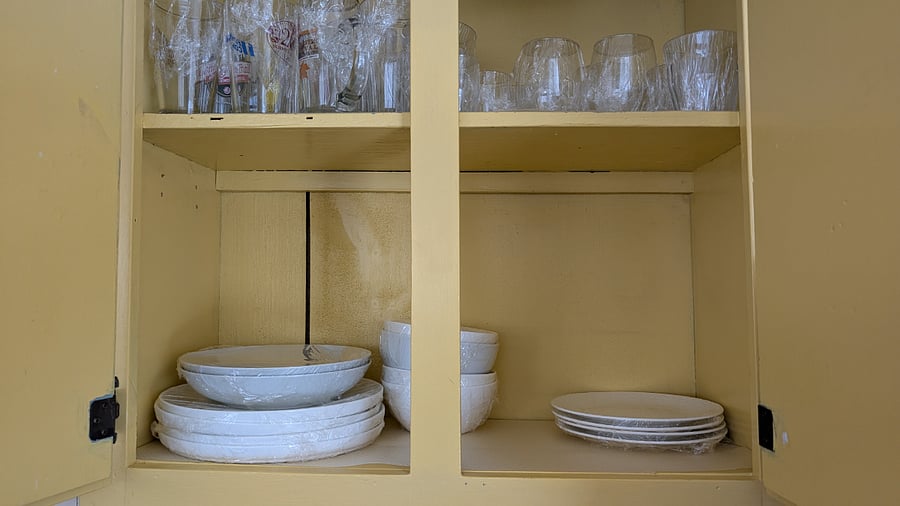 Dishes and assorted glassware, including wine and beer glasses