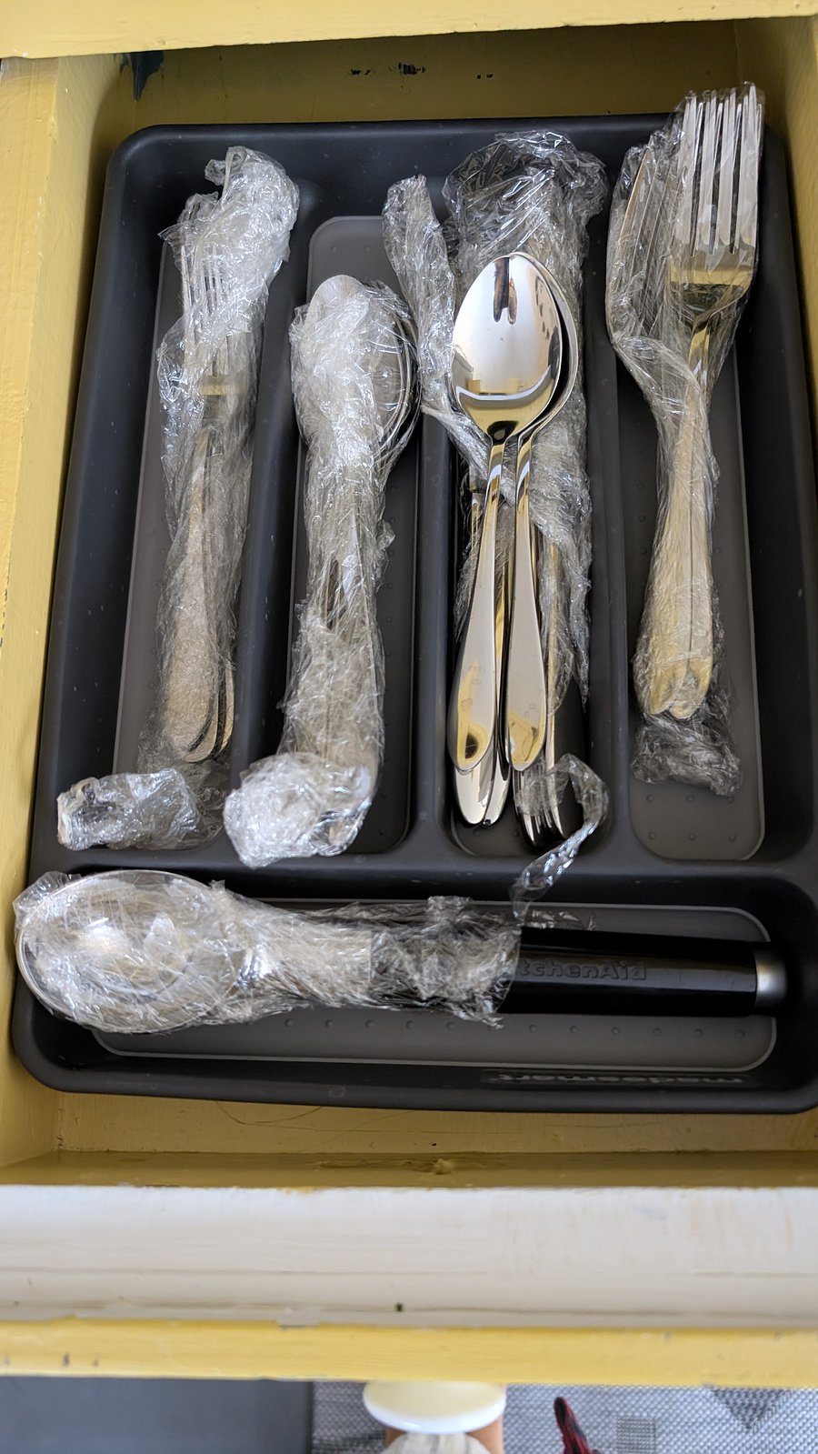 Eating utensils and ice cream scoop.