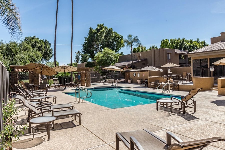 Community pool with loungers