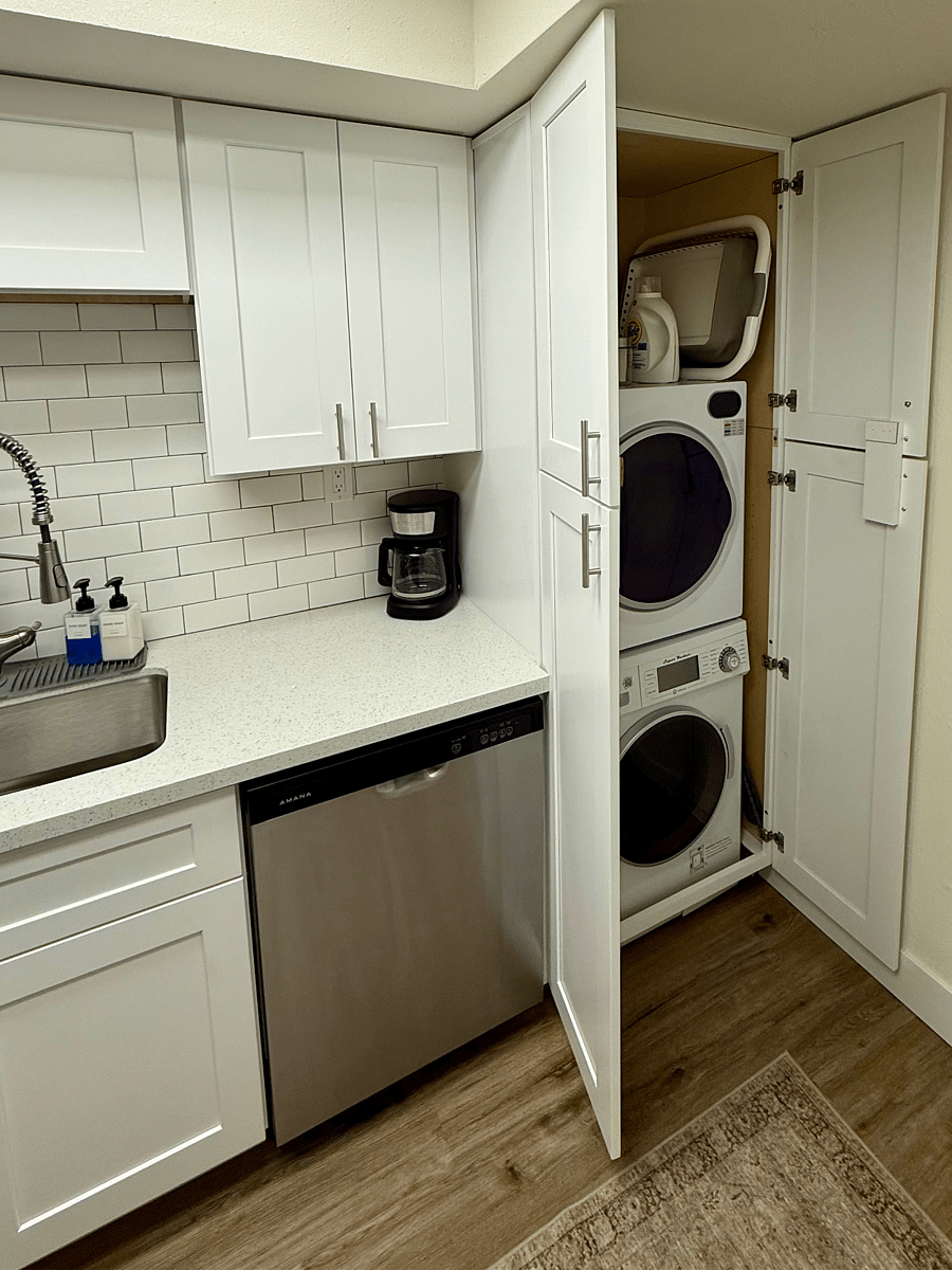 In-unit stacked washer and dryer