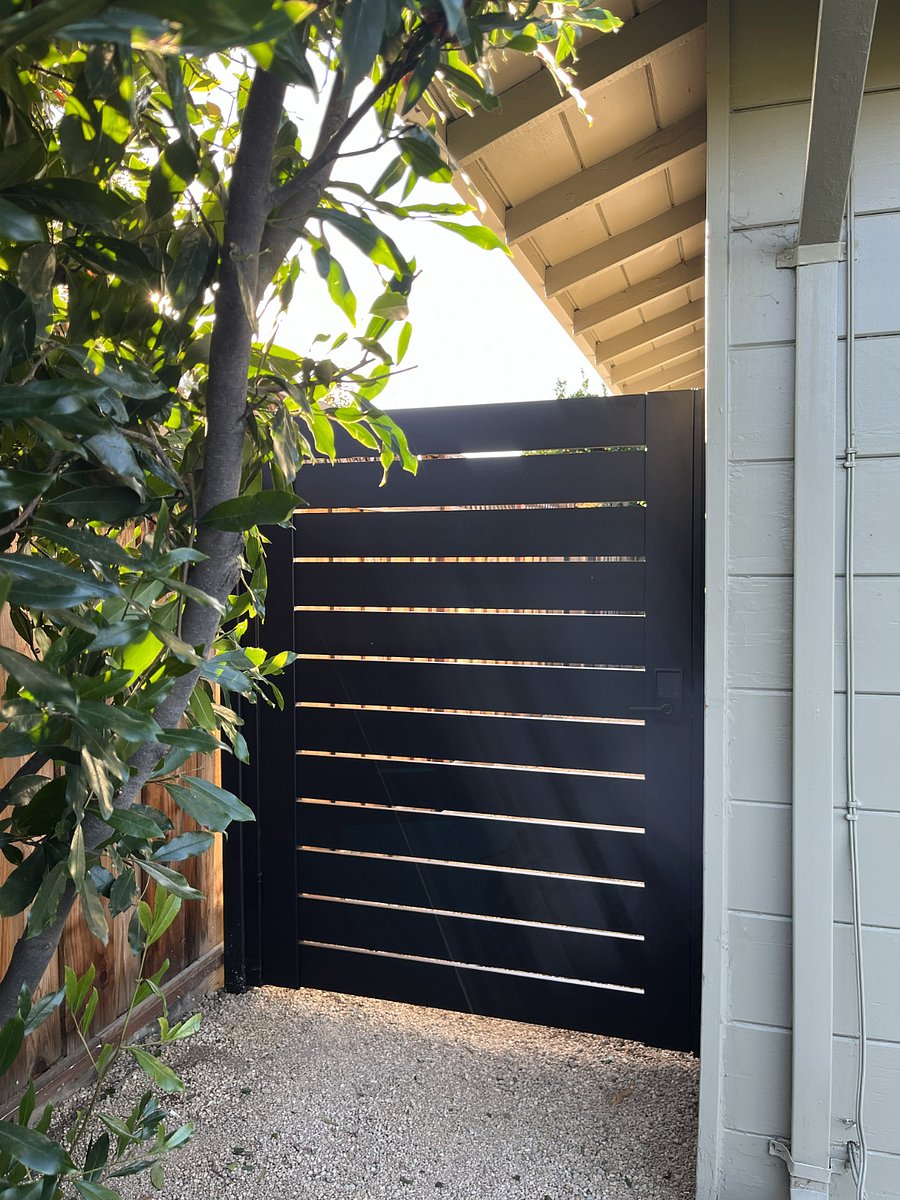 Private entrance. Secure metal gate with smart lock