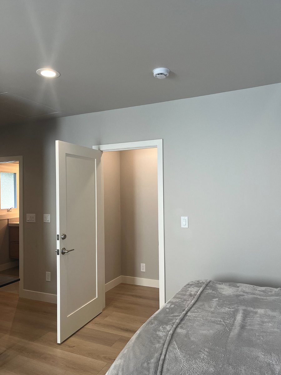 storage space that could be used extra closet, office, and storage for suitcase etc