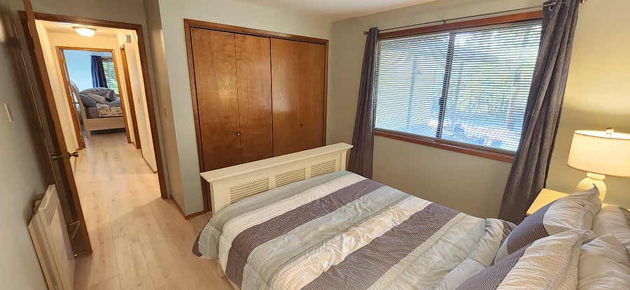 Downstairs room #1. Full size bed with closet and 6 dresser drawer .