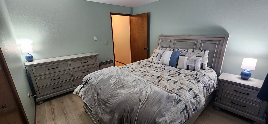 Downstairs room #2. View 2. Queen size bed.