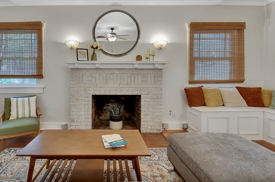 Living room with historic hardwood floors and fire place
