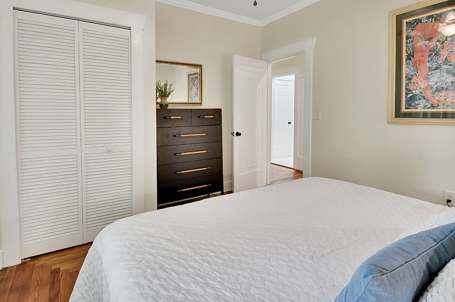 Master bedroom with king bedWall