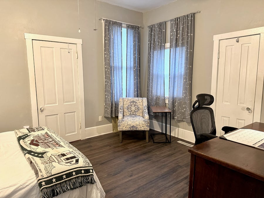 Door on the left leads to closet with stacked washer& dryer 