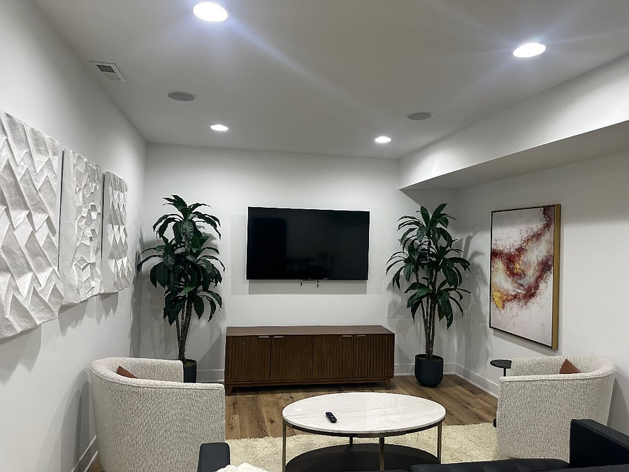 additional living room access to the full basement, including the high top table extra couch, Pac-Man machine in an area where you can put in an extra bed is $1800