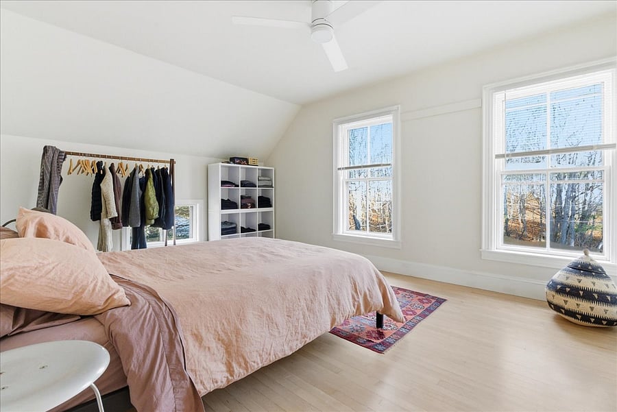 huge primary bedroom with queen bed