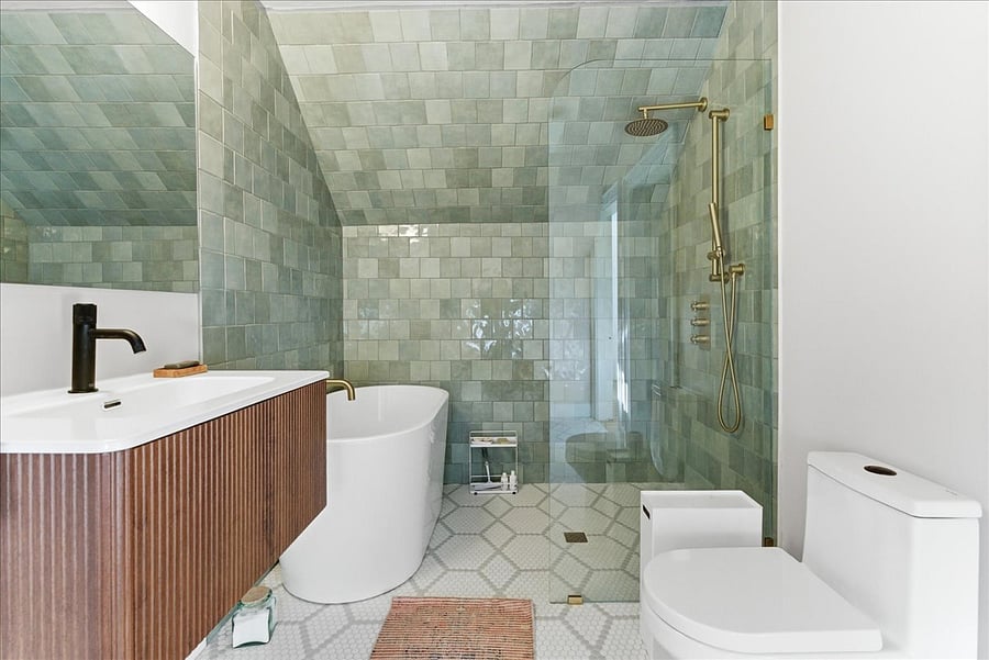 new bathroom with walk in shower and soaking tub. Shower has thermostatic controls