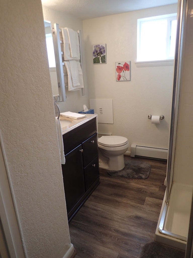 Bathroom with heated towel rack