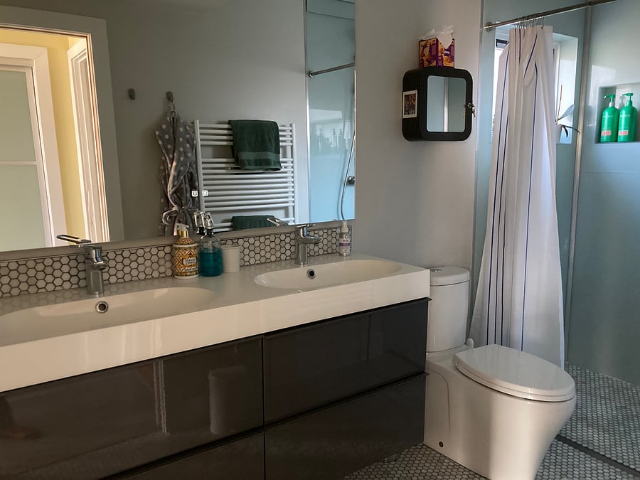Full bathroom with shower in master bedroom