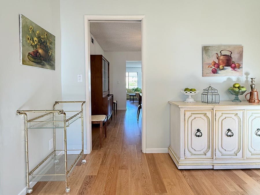 Kitchen nook has a pocket door leading to the dining room.