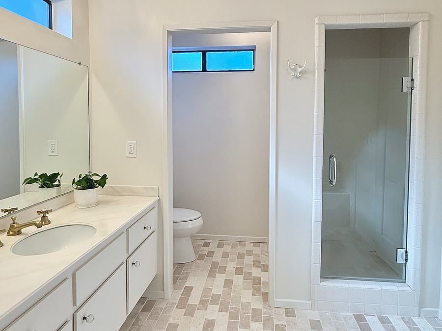 New tile floor and new frameless glass shower door.