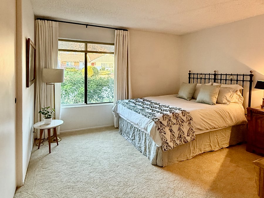 Hall bedroom (near the family room) has a desk, a dresser, and a large closet. New carpet. Newer mattress.