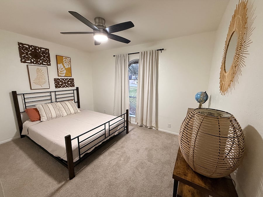 Room with queen bed.