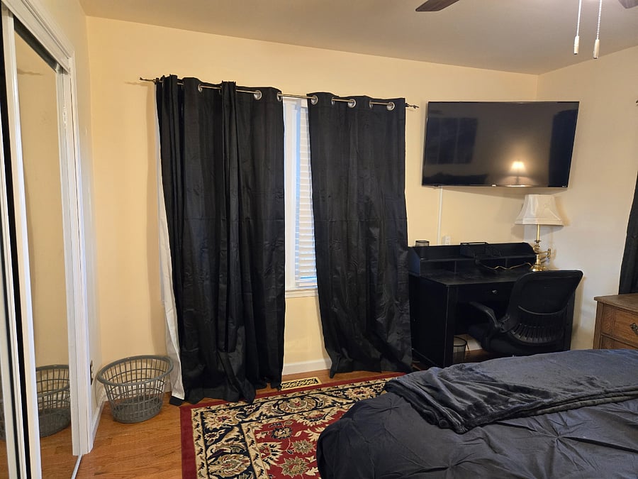 Desk, chair, Smart TV, black out curtains and shades in each room