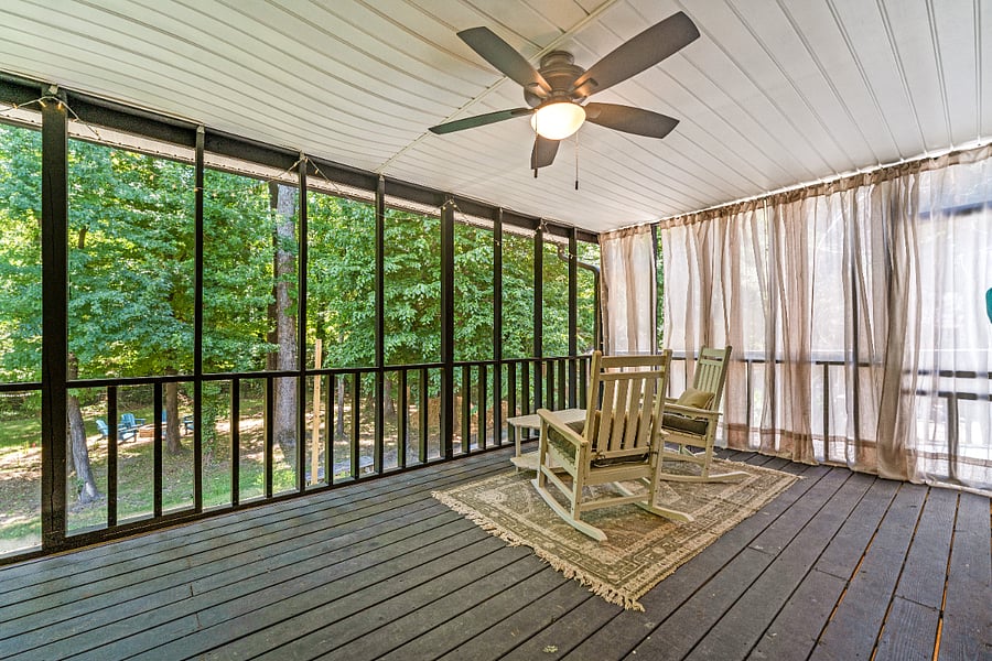 Relax on thick cushioned chairs overlooking the yard.
