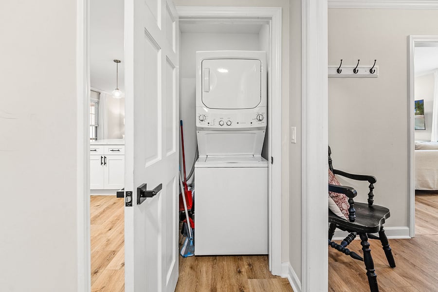 Washer Dryer and Broom Closet in Hallway near Kitchen.