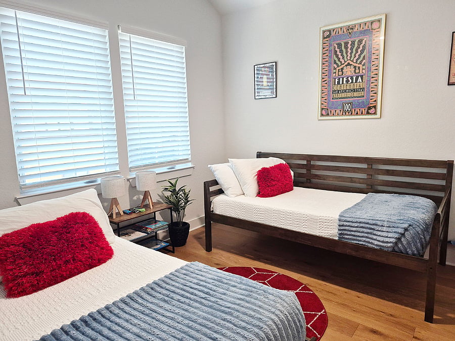 3rd bedroom with flexible sleeping options. Can be set up as 2 twins (pictured), a short king (75" long) or a single trundle/daybed. Room also has a 50" SmartTV.
