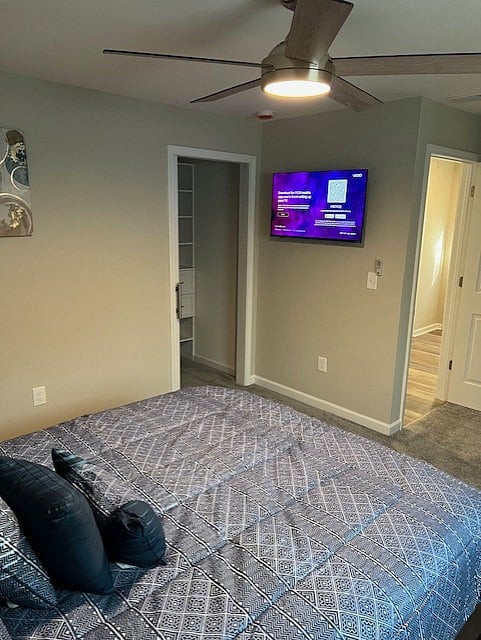 Primary bedroom with mounted TV