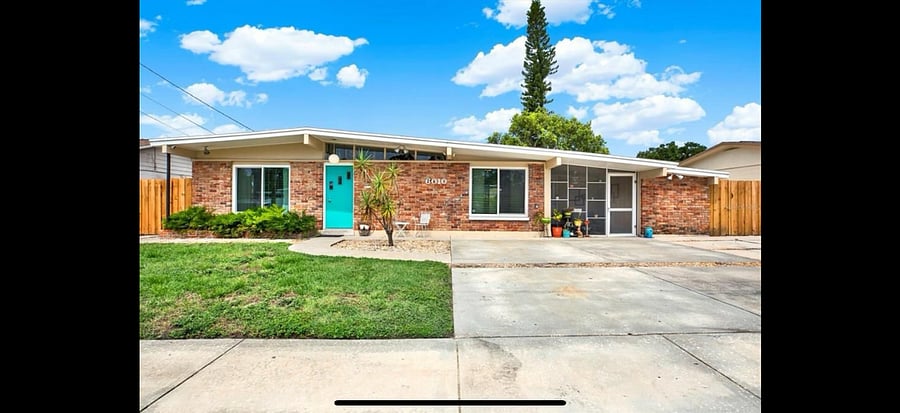 Apartment is on the right. Entrance door is in the screened porch