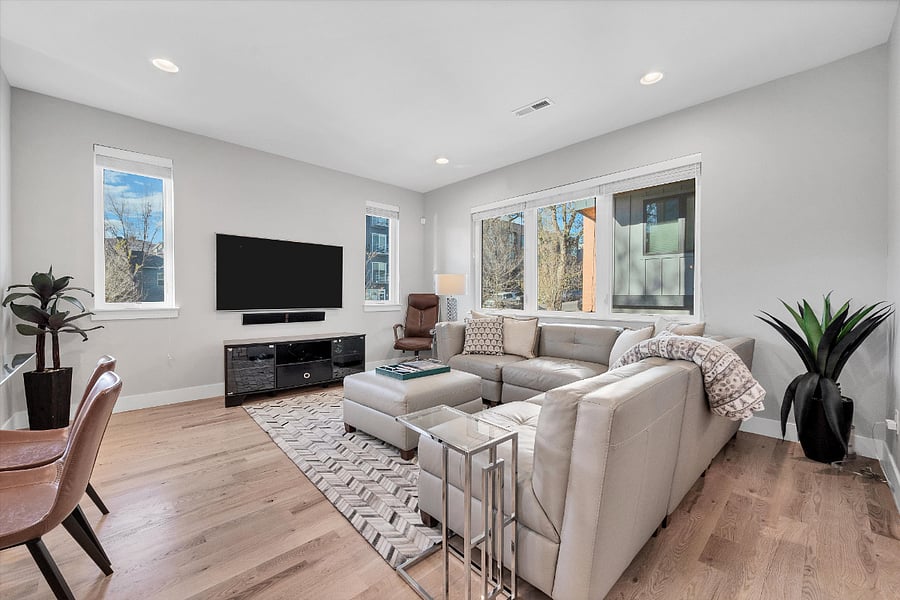 Second Floor: living room w/ 65in. smart tv and soundbar