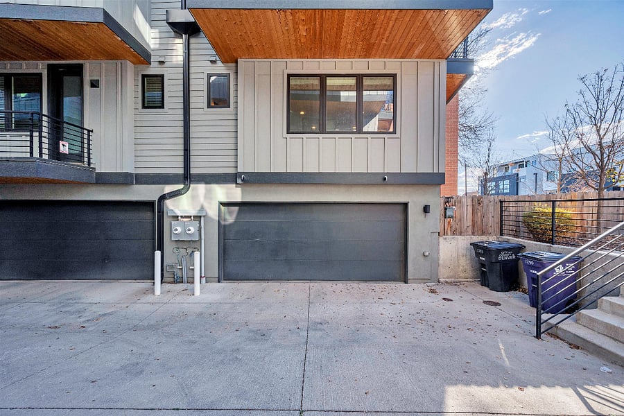 Exterior: Two car garage connected to unit