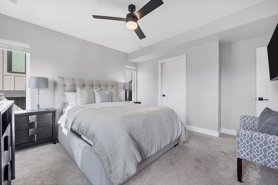 Third Floor: primary bedroom w/ balcony and walk-in closet
