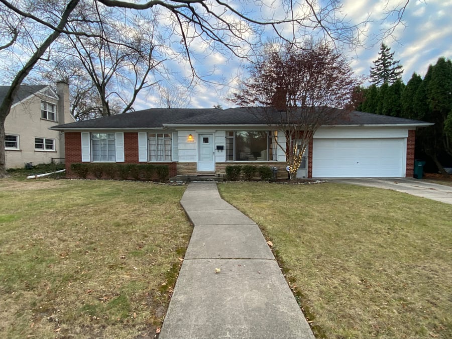 Attached two car garage for inclimate weather, added security and easy access with remote provided.