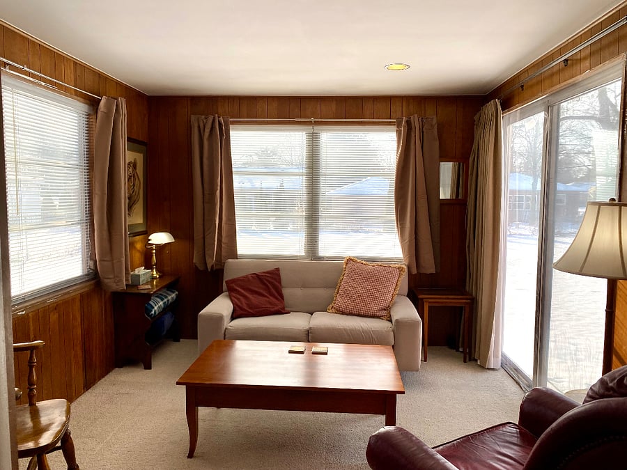 Family room with 55" smart tv. Plenty of light. Also, has black out shades. Sliding glass door for easy access to fenced backyard.