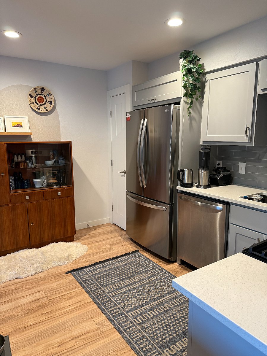 New stainless steel appliances in the kitchen.