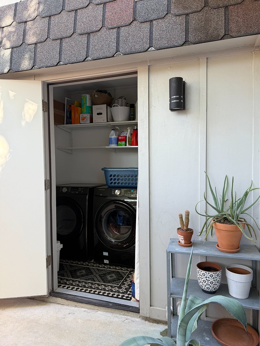 Laundry is on the patio, right off the living area.