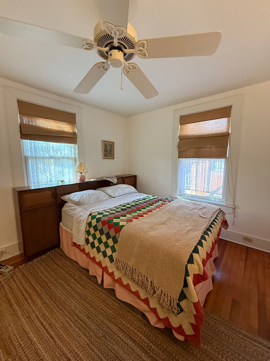 the bedroom with celing fan and two operable windows. Also central airl. (Because its the second floor, after all.)